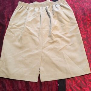 Tradition size 18W pale green skirt, back elastic, embellishments on front, new